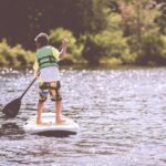 boy paddleboard paddle life jacket 1853960