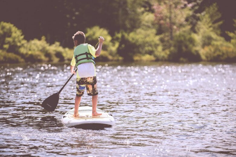 boy paddleboard paddle life jacket 1853960